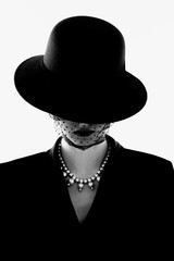 High fashion portrait of elegant woman in retro look.