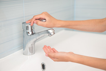 no water consumption lack concept of little kid hand opening stainless empty mixer tap faucet in...