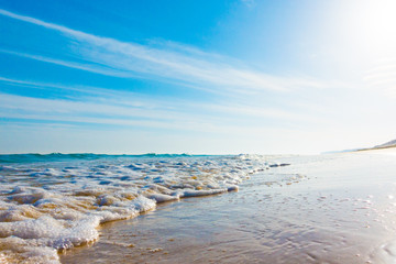 Bursts of sea waves on a tropical sea beach,