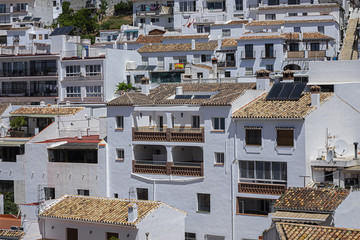 Beautiful aerial view of Mijas - Spanish hill town overlooking the Costa del Sol, not far from Malaga. Mijas known for its white-washed buildings. Mijas, Andalusia, Spain.