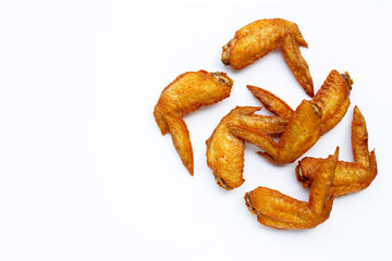Fried chicken wings on white background.