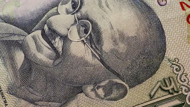 100 Indian rupee banknote close up. Mahatma Gandhi portrait. Currency background.