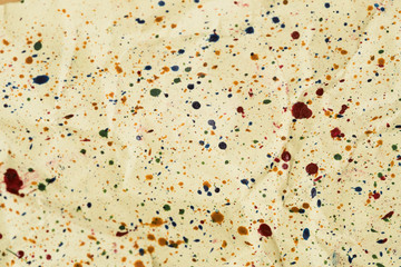 Seamless pattern with speckles different color. Spots of paint, small drops. Colorful abstract background. On pink. Texture print for clothes, fabric, textile, website, card, wrapping paper, wallpaper