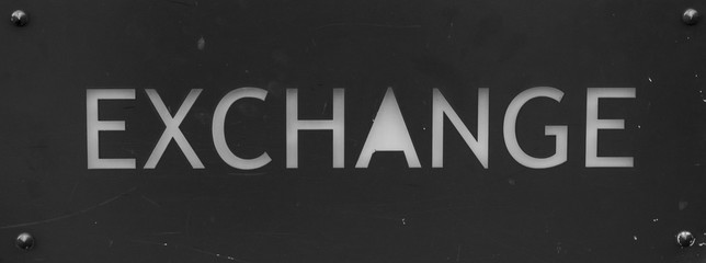 It says exchange in white on gray background.