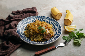 Mofongo, mashed  boiled plantains with porc meat, onion. Puerto Rico.  Amazonian cuisine, Peru, Cuba, Fufu de platano, tacaho