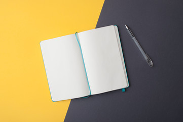 Minimal flatlay with blank sketchbook