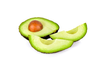 cut ripe avocado with seed on white background