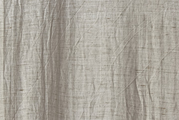 The texture of the natural old cotton fabric is exposed to sunlight.