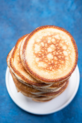 Stack of Pancakes on Plate. Overhead Close Up View