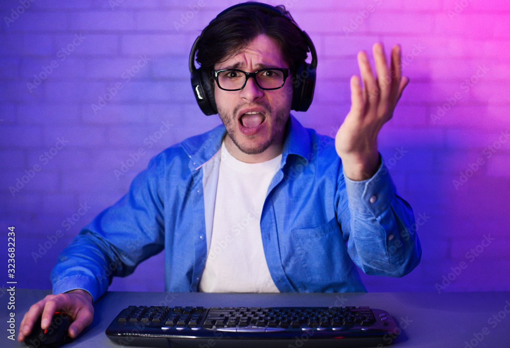 Poster angry gamer losing game playing online on computer at home