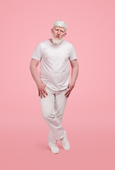 Modern albino male in white outfit