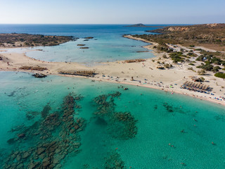 Obraz na płótnie Canvas Top view of the Elafonisi beach on the island of Crete in Greece, in the frame is azure water and a recreation area. Aerial photography