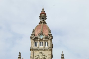 Fototapeta na wymiar Facade of thetower of town hall of La Coruña in the Plaza de Maria pita