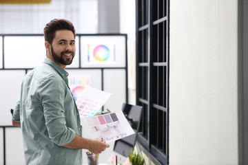 Portrait of male designer in office. Creative profession