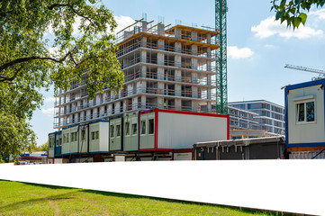 Blank white banner for advertisement on the fence of construction site
