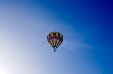 Air balloon on the blue sky background