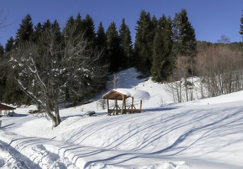 Wooden picnic gazebo in the snow-covered .Savsat/artvin/turkey