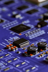 Electronic circuit board close up.