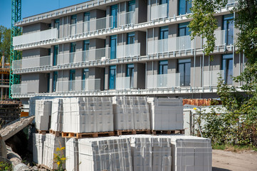 Modern building under construction on a sunny summer day