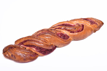 Bun with raspberries on a white background..