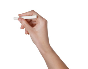 Woman holding piece of chalk isolated on white, closeup