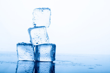 ice cubes on blue background