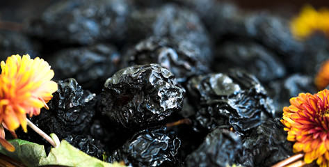 Dry plums with flowers