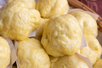 close up of homemade yellow streamed bun, Thai style