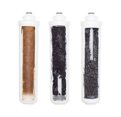 Used water cartridges in section on a white background. The concept of water purification from...