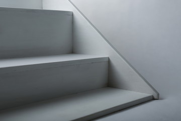 white plywood stairs on a gray background