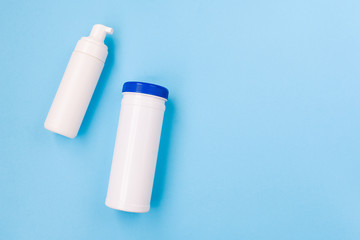 Set of cosmetic plastic bottles. Skin, body care. Branding mockup, top view, flat lay. Beauty treatment concept. Minimalism.