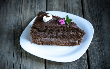 Piece of cake on the wooden table