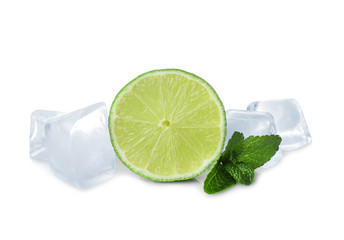 Ice cubes, mint and lime on white background