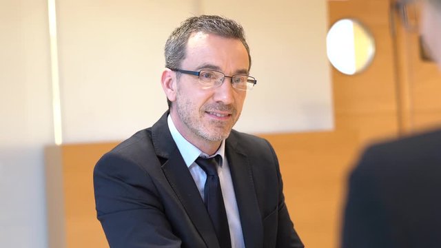 Executive man having an interview for job position