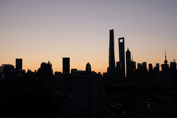 Silhouette of Shanghai Pudong Lujiazui skyline at sunset. Financial center of China