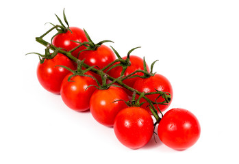 Cherry tomatoes isolated over white background