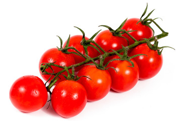 Cherry tomatoes isolated over white background