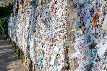 Virgin Mary Church wish wall. Prayer writings for Virgin Mary