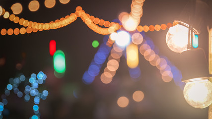 Colorful night lights blurred abstract bokeh farewell party lights from colorful light bulb for...