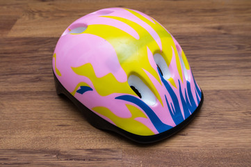 skating protection equipment, helmet and knee  wrist protectors, on a white background