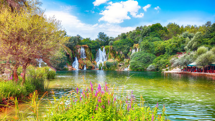 Fototapeta na wymiar Picturesque Kravice waterfalls in the National Park of Bosnia and Herzegovina