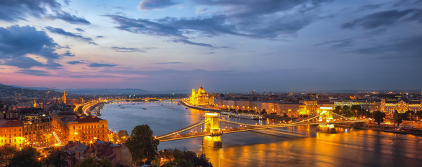 Fototapeta na wymiar View at Chain bridge, river Danube and famous building of Parliament.