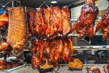 Roasted chicken and crispy pork meat at Chinese Singapore restaurant