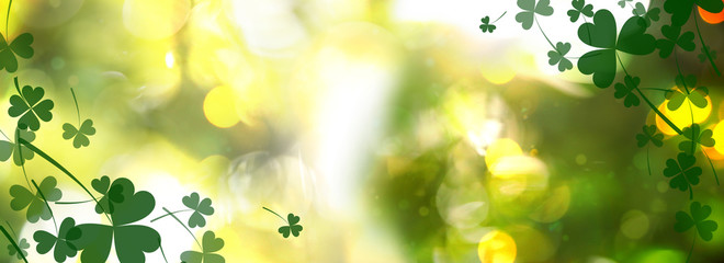 Beautiful clover leaves on blurred green background. St Patrick's day