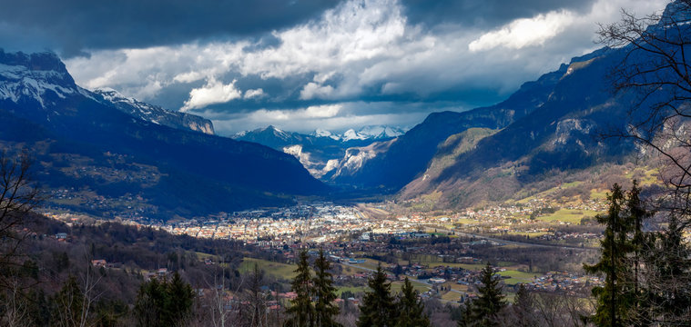 Beautiful moody panoramic view from Combloux in winter on the mountain range above the Sallanches city near Chamonix.