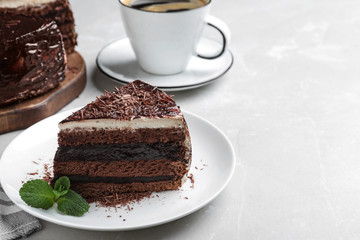 Tasty chocolate cake on table. Space for text