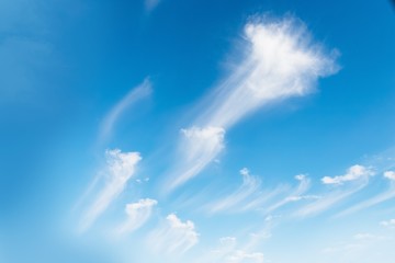 Beautiful white clouds on a blue sky background. Clouds Like a brush strokes