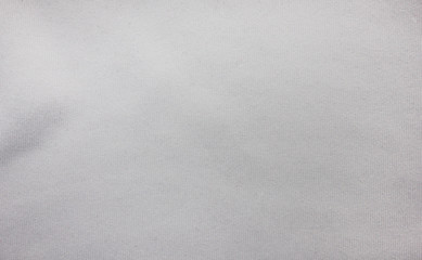 White texture background, light grey fabric pattern. Casual seamless cloth background, simple white fabric texture close up top view. Silky white surface, casual elegant sheet backdrop 