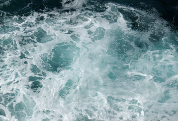 Fototapeta na wymiar Blue frothy surface of sea