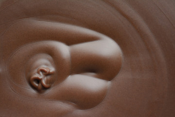 Chocolate paste close-up. The texture of the chocolate spread